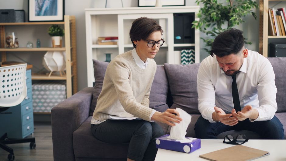 Therapist guiding a patient through emotional regulation tools